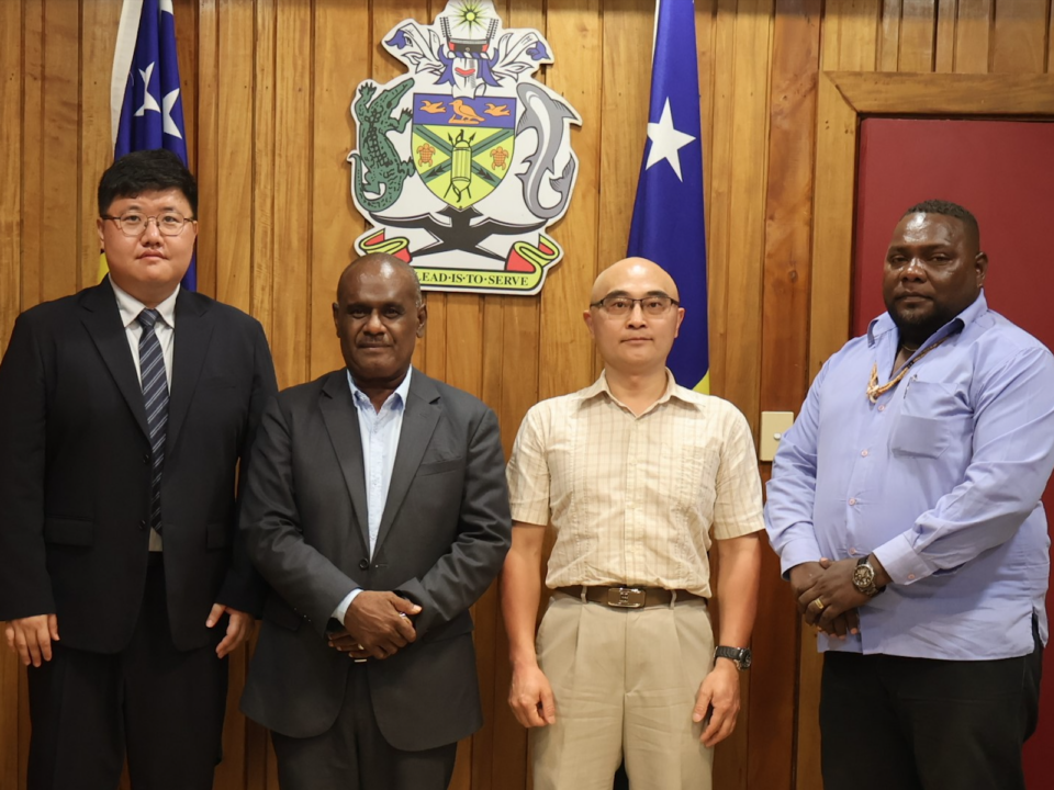 Prime Minister Hon. Manele MP, Tony and Vincent of SINOMACH and MRD Deputy Secretary Technical George Balairamo.